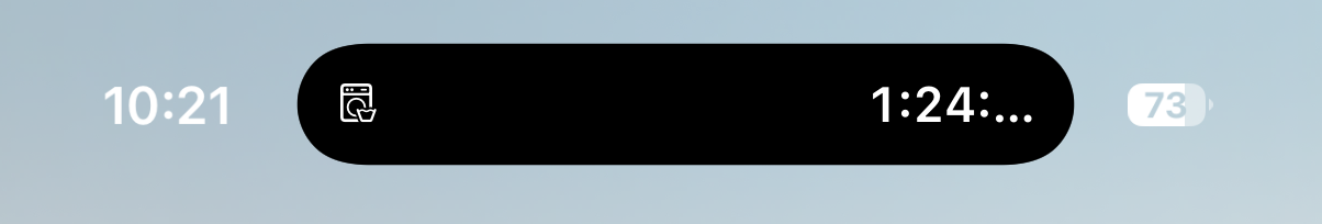 iPhone Dynamic Island compact, showing a small washer glyph and the time remaining.